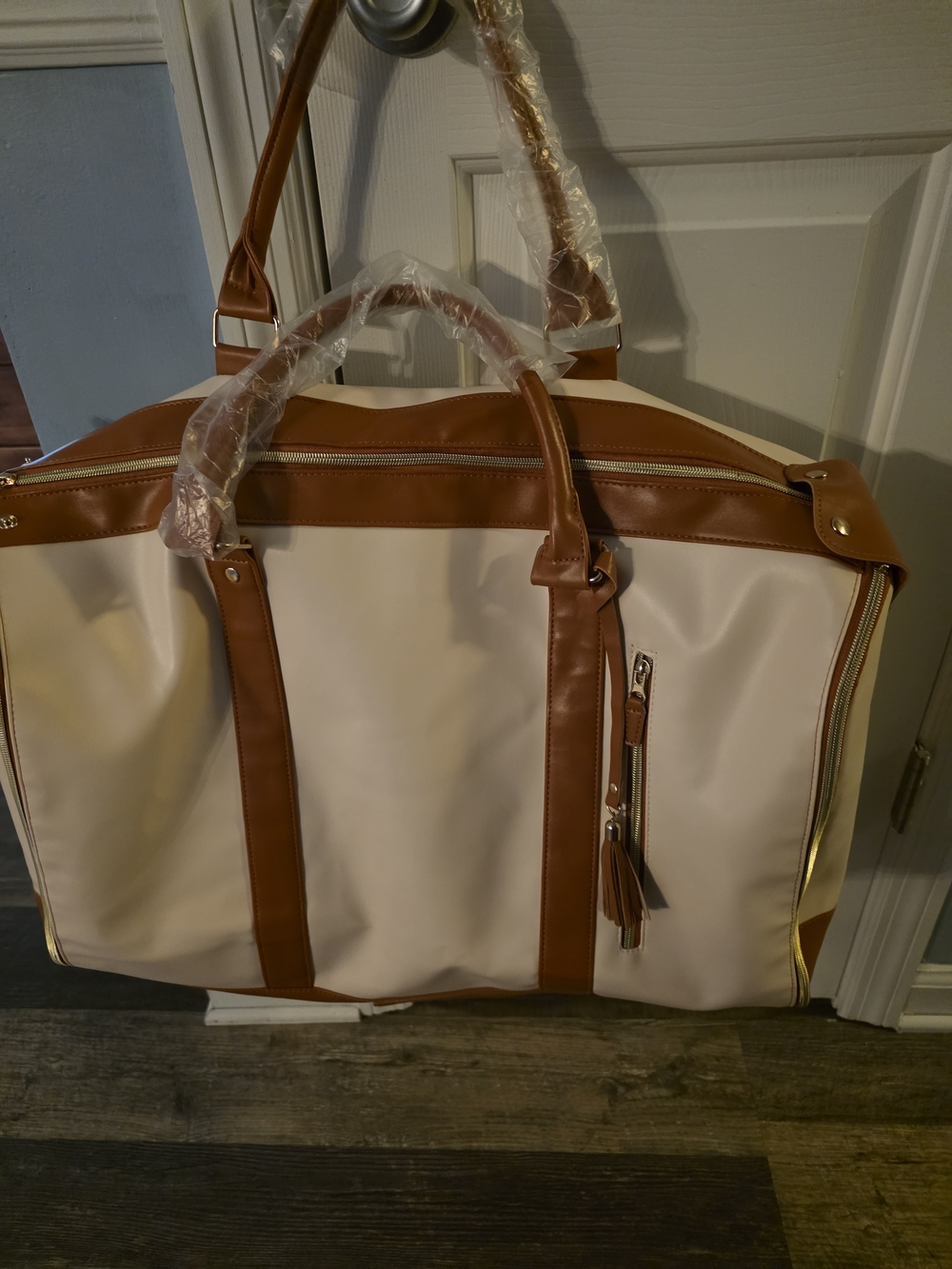 Women's Cream and Tan Duffel Bag with Tassel Accent